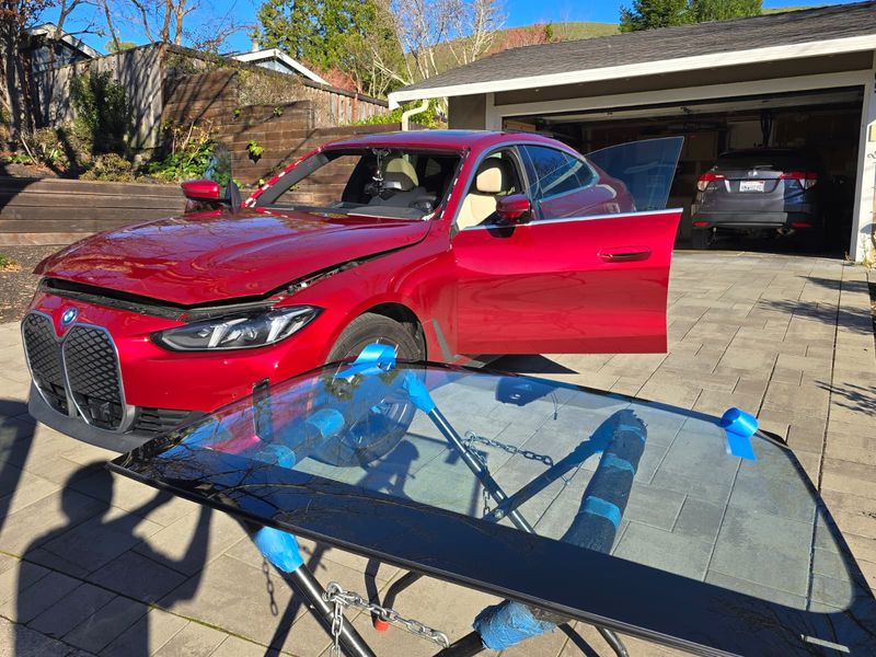 BMW iX windshield on stand ready for installation in San Jose